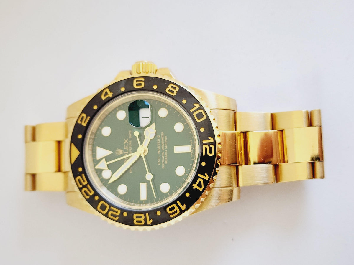 RARE, Rolex GMT-Master II Yellow Gold Green Dial & Ceramic Bezel Oyster Bracelet