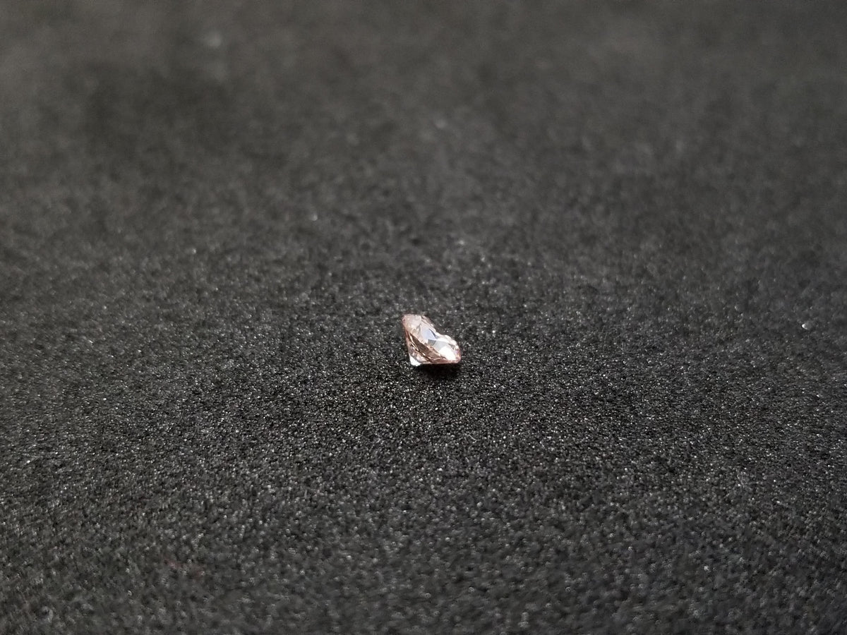 MARKDOWN IGI, 0.18 Carat Natural Fancy Light Pinkish Brown Round Shape Diamond