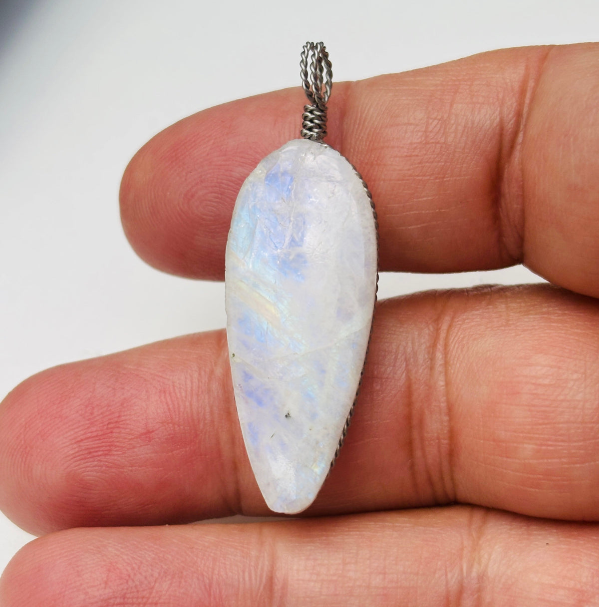 PRICE TO SELL, LARGE Pear shape moonshine pendant subtle blue glow, 1.50 inch