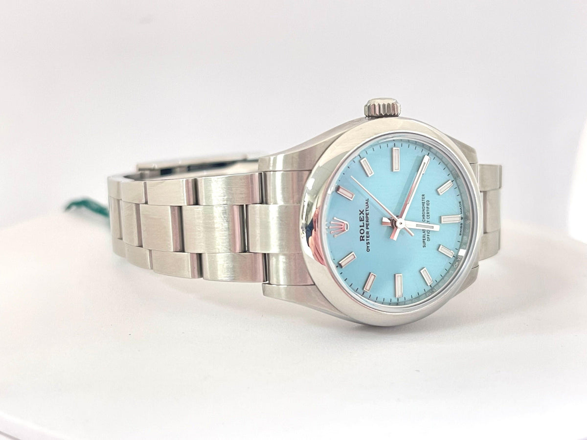 Rolex Oyster Perpetual 31mm Turquoise Blue Dial Steel Watch 277200