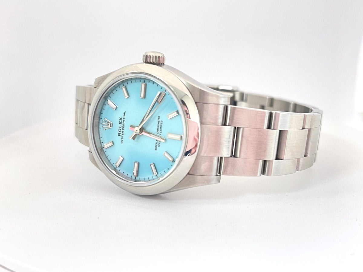 Rolex Oyster Perpetual 31mm Turquoise Blue Dial Steel Watch 277200